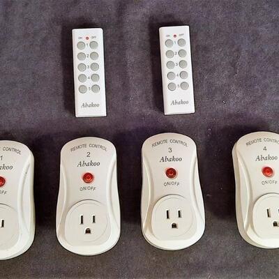 Lot 222  Abakoo Remote Control Set ( 2 Remotes & 4 Outlet Adapters)
