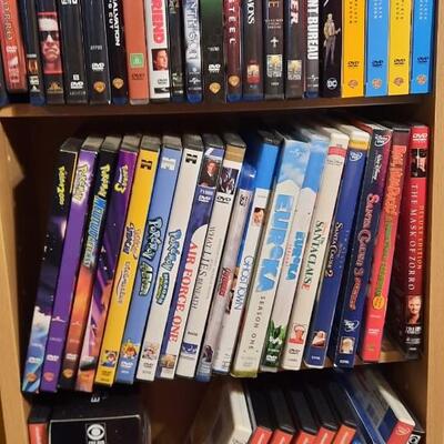 Lot 225  Movie Lover #3  DVDs & Display Rack Approximately 340 DVDs