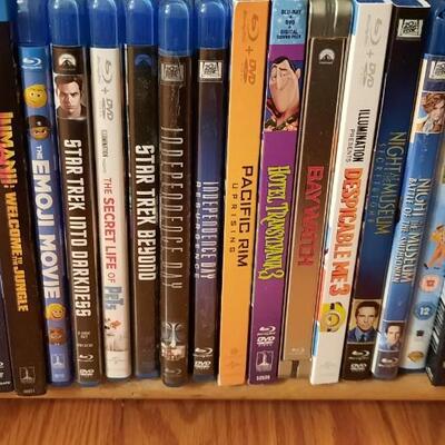 Lot 226  Movie Lover #4 Display Rack  & Mostly Blu-Rays  Approximately 125