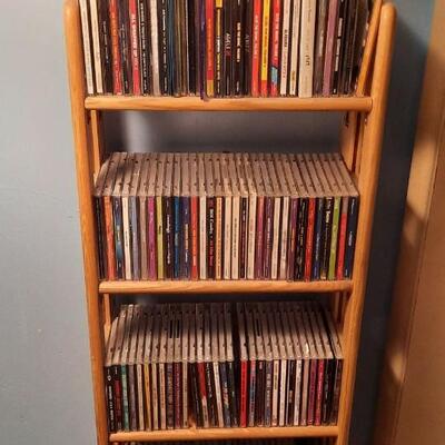 Lot 229  Variety of CDs and Rack