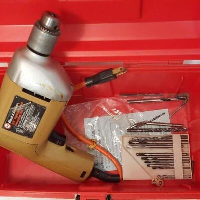 Lot  234  Red Plastic Tool Box with Corded Drill
