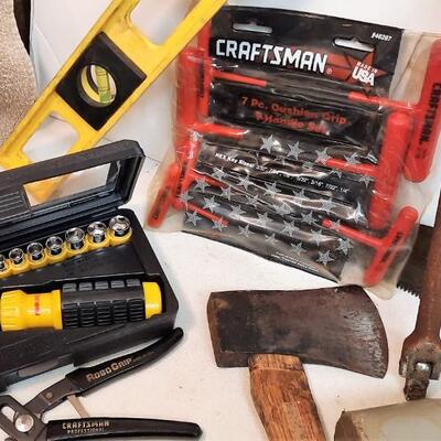 Lot 251  Assorted Tools: Level, Saw, Mallet, Ratchet/Screwdriver Set, & More