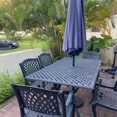 Rectangle patio table and chairs.umbrella included.