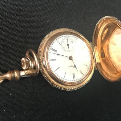 Lot 21: Masonic Collectibles - Freemasonry working Elgin Pocketwatch and goldfill chain and 10k fob, Medal & More