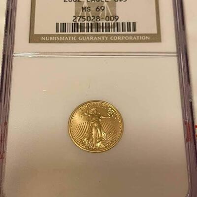 2002 5 $  1 /10 oz Gold Eagle MS 69 . Reserve set