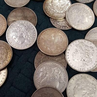 20 Morgan silver dollars various  dates .Reserve set.