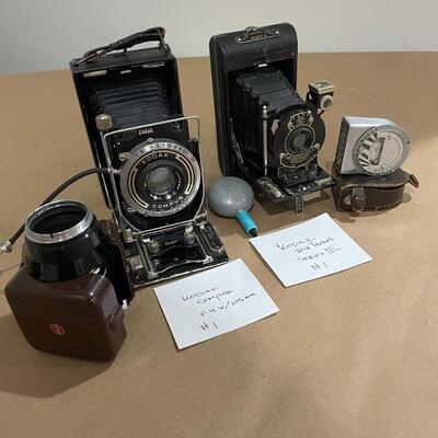 Kodak Folding Pocket Cameras with accessories.