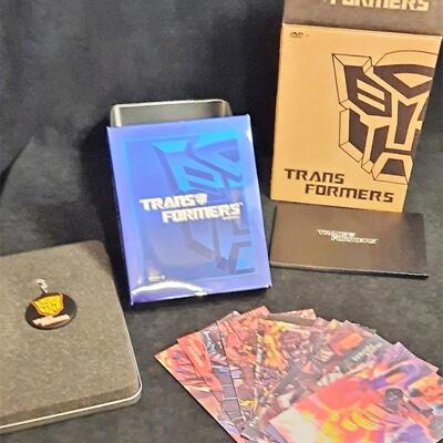 Lot 301  Transformers DVD Set with Action Picture Cards
