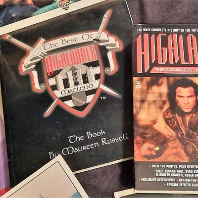 Lot 307  Highlander Group:  2 Books & Poster Pack