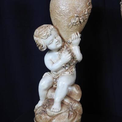 Pair of figural Child Statues