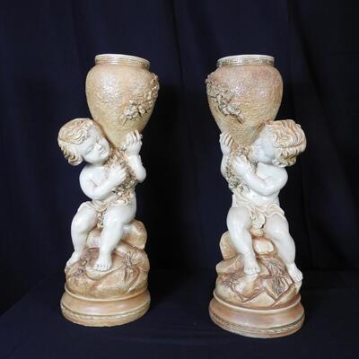 Pair of figural Child Statues