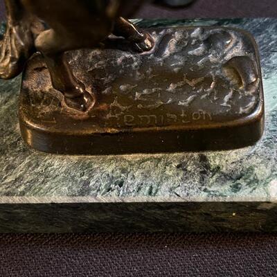 Small Bronze not quite Remington Cowboy Bronco Buster