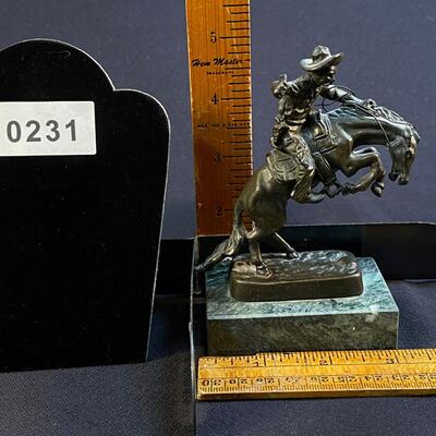 Small Bronze not quite Remington Cowboy Bronco Buster
