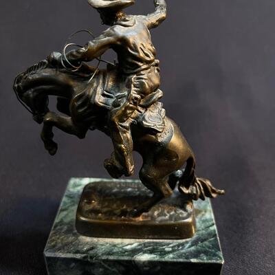 Small Bronze not quite Remington Cowboy Bronco Buster