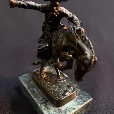 Small Bronze not quite Remington Cowboy Bronco Buster