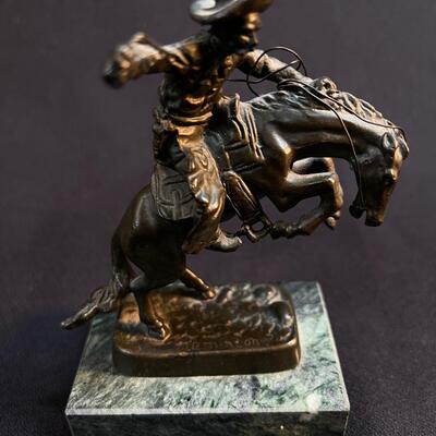 Small Bronze not quite Remington Cowboy Bronco Buster