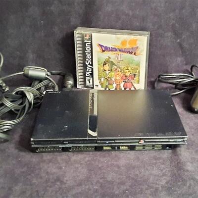 Lot 319  Sony PlayStation2, Controller, 1 Magic Gate Memory Card, & Dragon Warrior VII Game