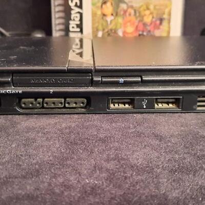 Lot 319  Sony PlayStation2, Controller, 1 Magic Gate Memory Card, & Dragon Warrior VII Game