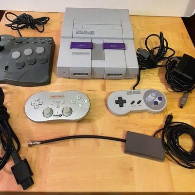 Lot 324  Super Nintendo Console, Retro Controller, Super Controller, Joystick Controller & Adapters
