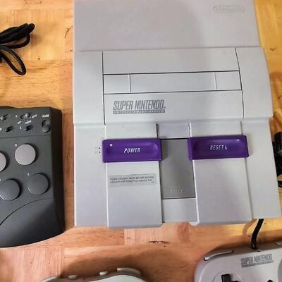 Lot 324  Super Nintendo Console, Retro Controller, Super Controller, Joystick Controller & Adapters