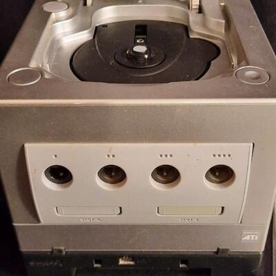 Lot 329  Nintendo Game Cube Console w/ Controller, Adapter, Instruction Booklet & Disk.