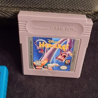 Lot 333  Nintendo Game Boy Color, Carry Case, Instruction Booklet, & Disney Hercules Game Included