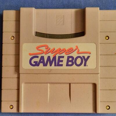 Lot 342  Super Game Boy Adapter Model # SNS - 027
