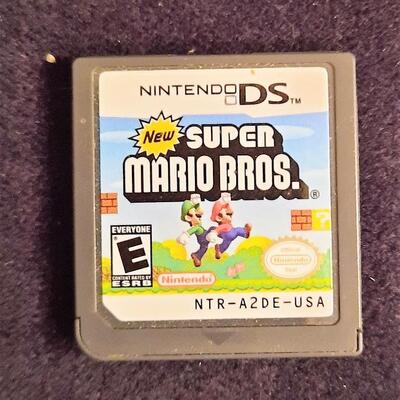 Lot 343  Nintendo 2 DS CL Handheld Console w/ 1 Game, Stylus, Adapter and Box