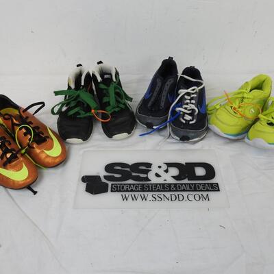 4 Pairs Kids Shoes: Nike Mercurial 2.5Y, Nike 1.5Y, Nike 2Y, Champion 1.5