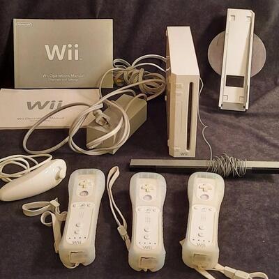 Lot 361  Wii Console, 3 Controllers, 1 Joystick, & Instruction Manual
