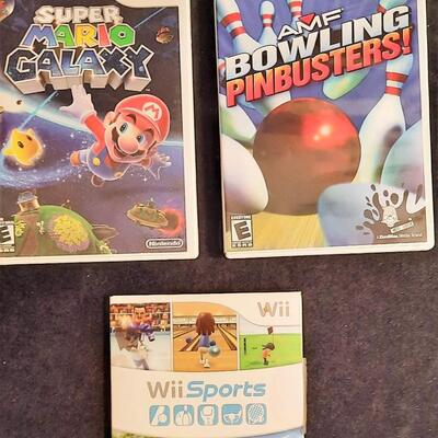 Lot 363  Wii Games Qty 3- Super Mario Galaxy, AMF Bowling Pinbusters, & Wii Sports