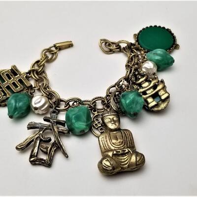 Lot #148  Vintage Charm Bracelet with Asian Styling