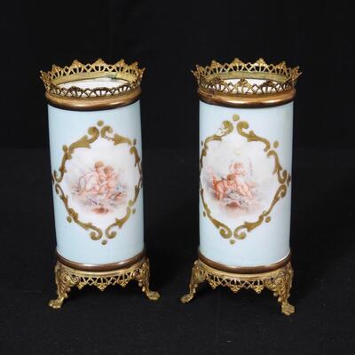 Pair of Porcelain and Brass Cherub Vases