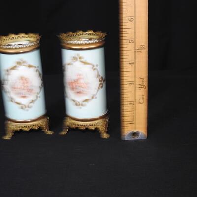 Pair of Porcelain and Brass Cherub Vases