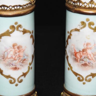 Pair of Porcelain and Brass Cherub Vases