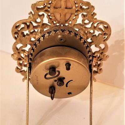 Lot #154  Vintage Alarm/Vanity Clock with Cameo inset - works