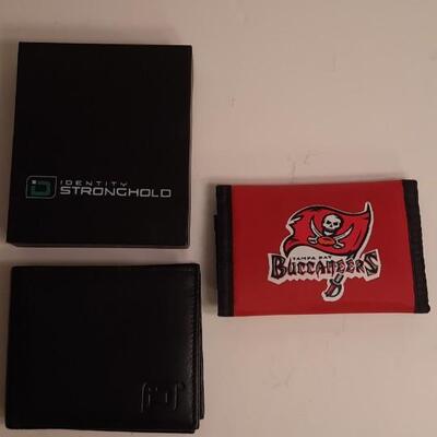 Lot 112.5. Identity Stronghold Wallet & Buccaneers Wallet