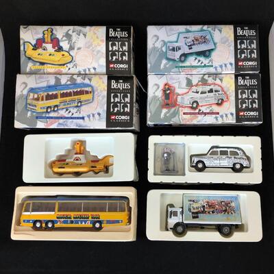 Lot of 4 Beatles Corgi Classics Limited 1997 Yellow Submarine Bus Taxi Cab and Billboard