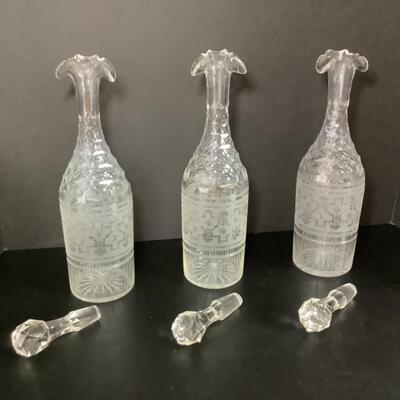 B - 250. Three Antique Etched Crystal Decanters with Stoppers
