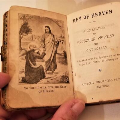 Lot #202  Religious Lot - antique sick call crucifix, prayer books, etc
