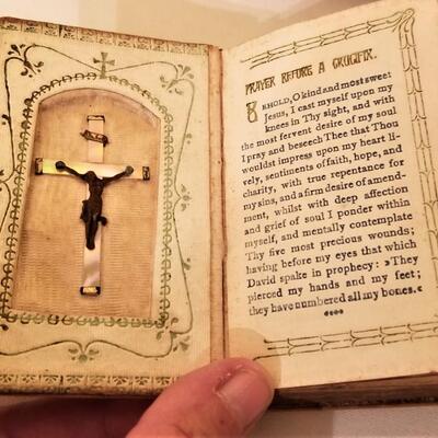 Lot #202  Religious Lot - antique sick call crucifix, prayer books, etc