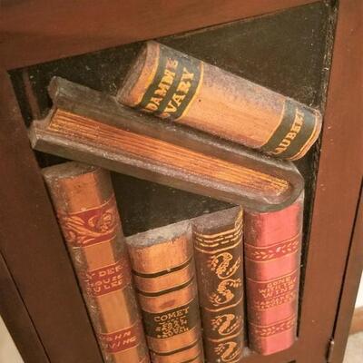 Lot #206  Contemporary Storage Cabinet with Book Motif