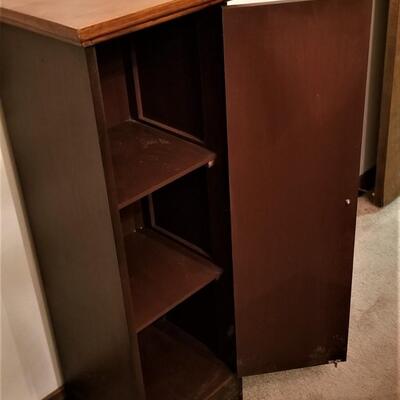 Lot #206  Contemporary Storage Cabinet with Book Motif