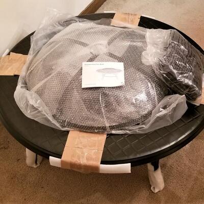 Lot #212  Brand new Outdoor Fire Pit - never used