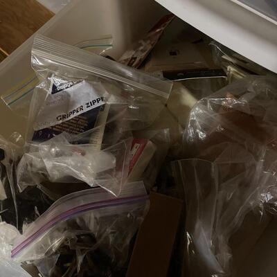 Lot of Four Filled Storage Drawers