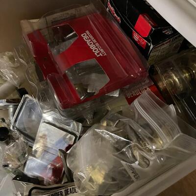 Lot of Four Filled Storage Drawers