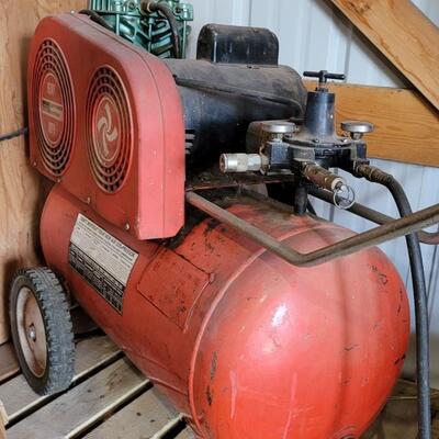 Lot 80: Vintage Montgomery Ward HEAVY DUTY Air Compressor w/ (3) Different Air Hoses Included