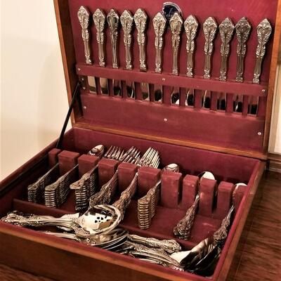 Lot #246  Complete Service for 12 - Oneida "Michaelangelo" Stainless
