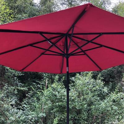 Outdoor Black Metal and Chairs Set with Red Umbrella and Extra Accent Tables