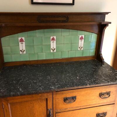 Beautiful Antique English Buffet Sideboard Table with Marble Top and Tile Back with Wheel Legs
